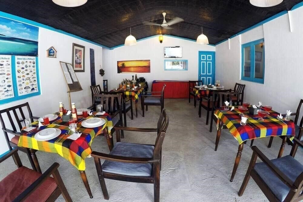 Картинка Rip Tide Vacation Inn Guest House гостиный двор